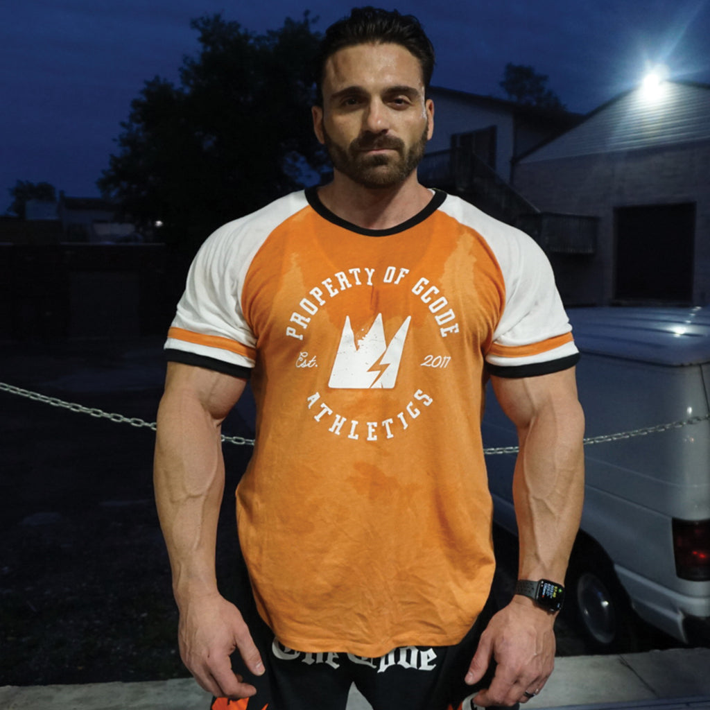 The GCode Athletics Varsity Shirt (Orange/Wht/Blk)